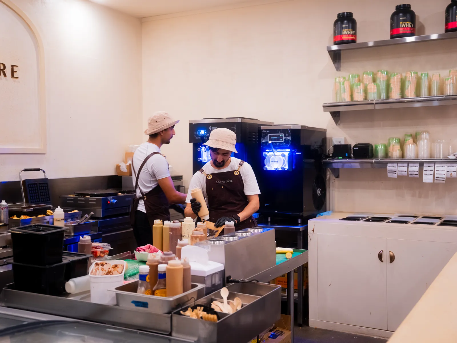 Baristas at the prep station