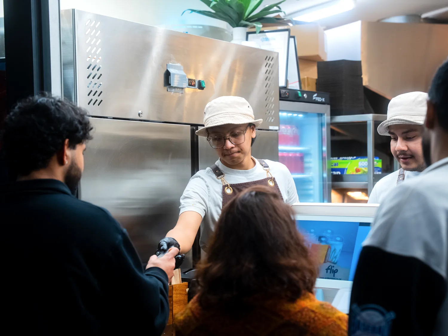 Flip team serving at the counter